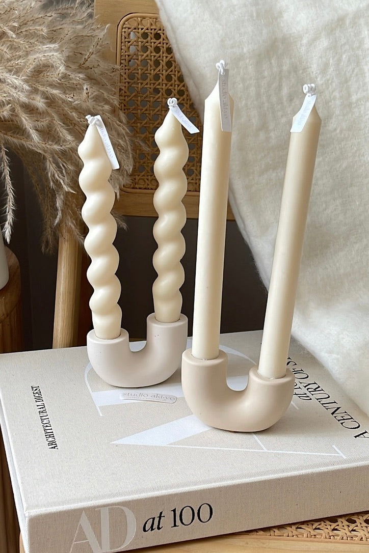 DOUBLE TAPER RISING CANDLE HOLDER