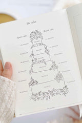 IVORY CLOTH WEDDING PLANNER BOOK W/ GOLD FOIL AND GILDED EDGES