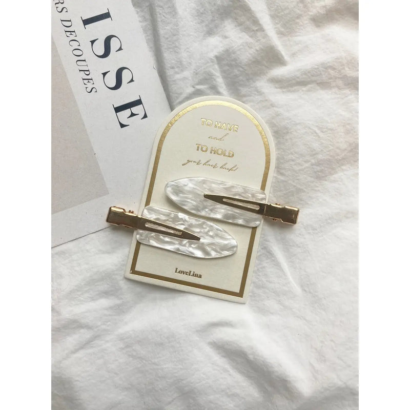 CREASELESS CLIPS